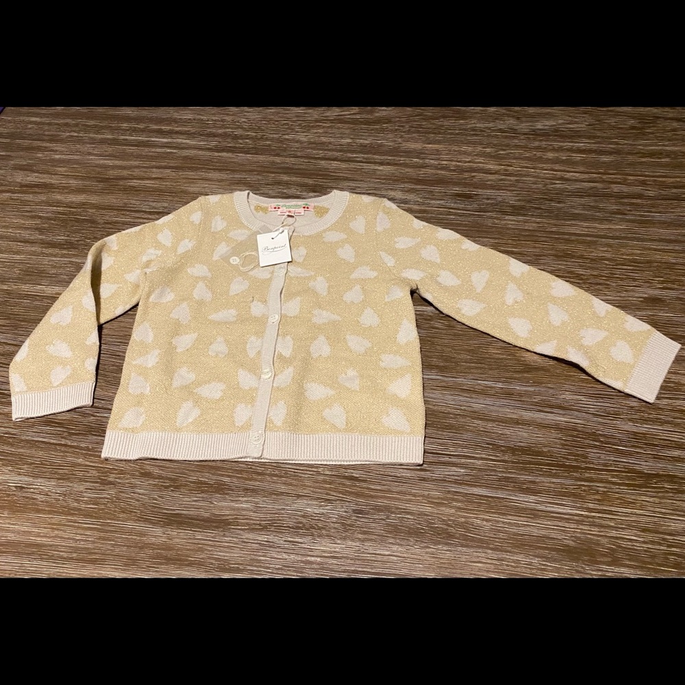Super soft Bonpoint baby’s cardigan sweater